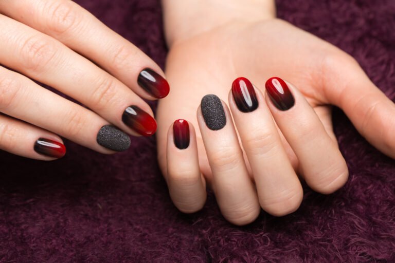 Shot beautiful manicure with gradient on female fingers. Nails design